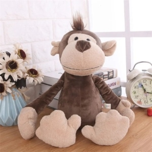 Petit singe en peluche