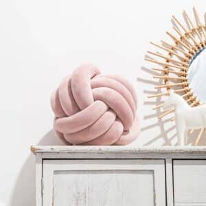 Coussin en forme de noeud​